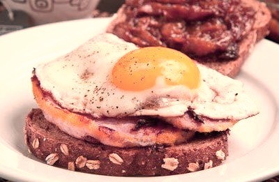 Peameal Breakfast Sandwich with Maple Caramelized Onions and a Fried Egg