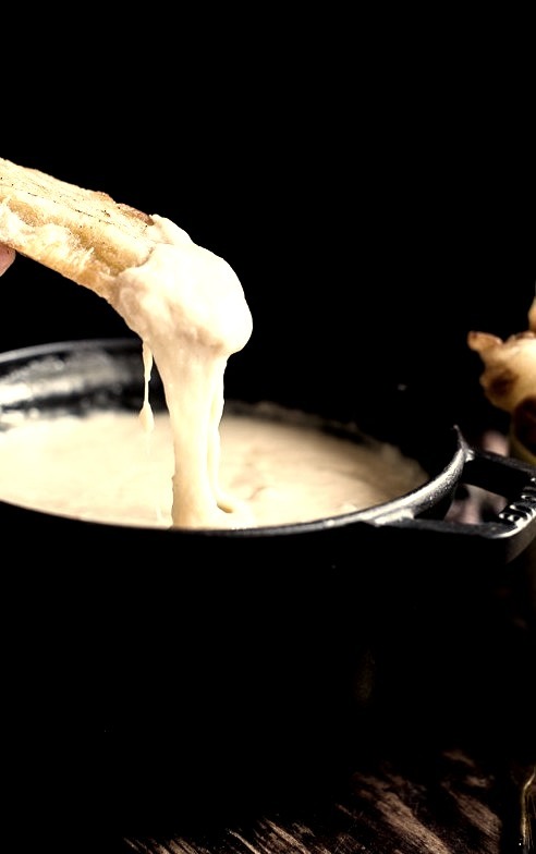 Smoky 3 cheese fondue with toasted garlic buttered croissants